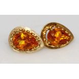 Pair of gold and citrine stud earrings