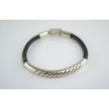 A Mexican Taxco silver and leather bracelet