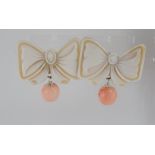 A pair of coral and cameo shell earrings