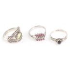 Three silver stone set rings