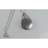 A double sided silver locket