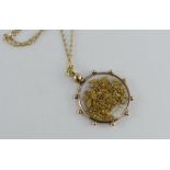 A vintage gold open locket pendant