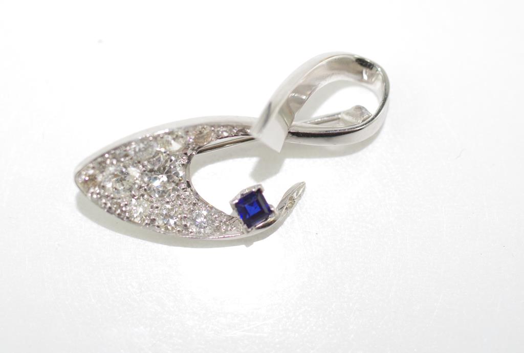 A good white gold, sapphire and diamond brooch