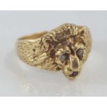 9ct gold, lion ring with diamond eyes