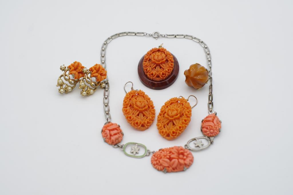 A collection of "coral" costume jewellery