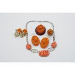 A collection of "coral" costume jewellery