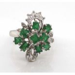 14ct white gold, emerald and diamond cluster ring