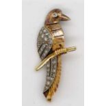 Gold and diamond bird brooch