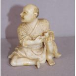 Antique Japanese ivory netsuke - Man with pipe