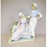 Large Lladro figurine of two ladies on a park seat