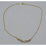 Two tone gold diamond set pendant on chain