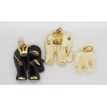 Three vintage carved elephant charms