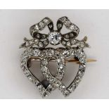 Antique diamond and gold heart ribbon brooch