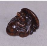 Japanese carved wood netsuke