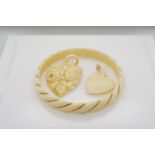 A collection of vintage carved ivory jewellery