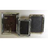 Three silver plated frames