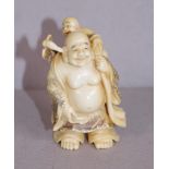 Antique Japanese ivory netsuke - Buddha and child