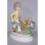 Goebel boy with wheelbarrow & dog figurine
