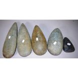 Five various Papua New Guinea stone axe heads