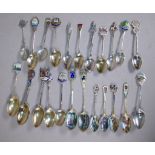 Twenty three various silver souvenir teaspoons