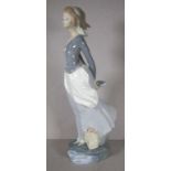 Lladro girl with book figurine