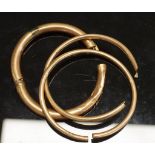 Three 9ct rose gold wax filled bangles