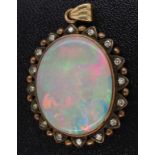 Antique gold and opal pendant with diamond dots