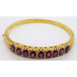 9ct gold diamond and amethyst bangle.