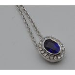 White gold, diamond and sapphire pendant