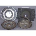 Four Indonesian hand embossed silver dishes