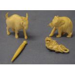 Four various vintage carved ivory and bone figures