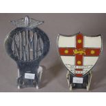 Two various vintage NSW insignia car badges