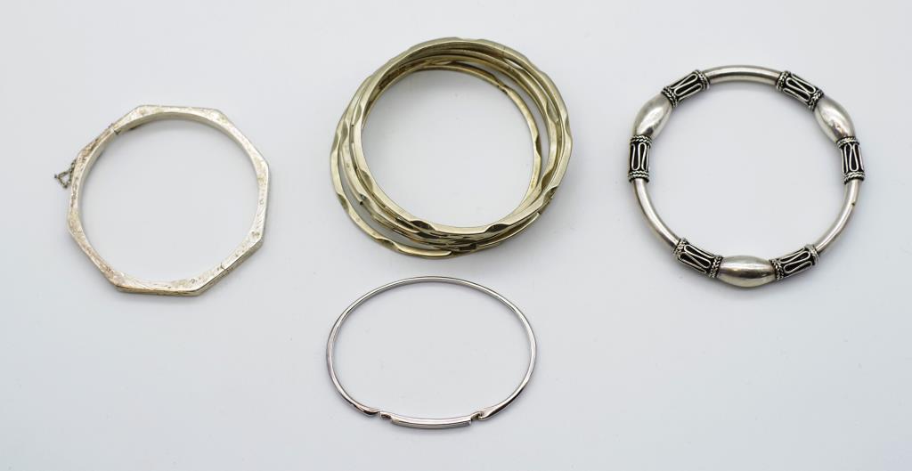 A collection of sterling silver bangles