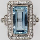 3.79ct aquamarine, diamond halo and gold ring