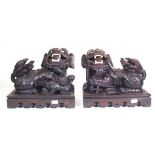 Pair vintage carved wood Chinese temple dogs