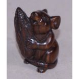 Japanese carved wood netsuke