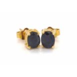 Sapphire stud earrings in 18ct gold mounts