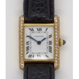 Cartier ladies gold & diamond tank watch