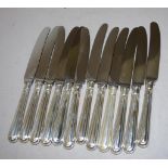Twelve Elizabeth II sterling silver entree knives