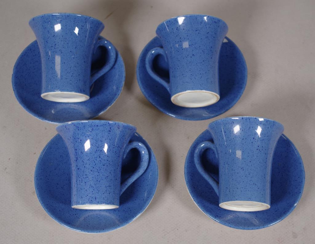 Four Moorcroft 'Powder Blue' coffee cups & saucers