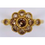 18ct gold and cognac diamond daisy ring