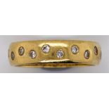 Diamond set 18ct gold ring