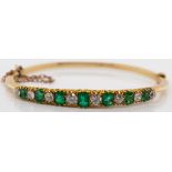 Antique diamond, emerald and 14ct gold bangle.