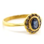 Sapphire diamond and 18ct gold daisy ring.