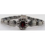 Silver and garnet bracelet.