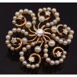 Victorian star gold, pearl and diamond brooch.