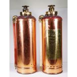 Two vintage simplex fire extinguishers