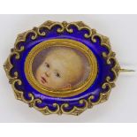 Antique gilt metal and enamel portrait brooch