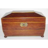 Regency rosewood caddy of angled sarcophagus form