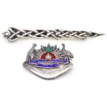 An Australian silver and enamel military brooch